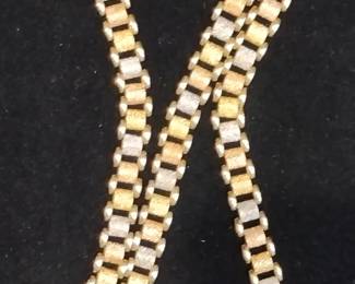 Monster 14k necklace with white,yellow, and rose gold links 