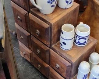 vintage step cabinet with goodies on top 