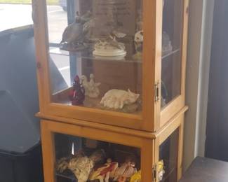 curio cabinet full of goodies 