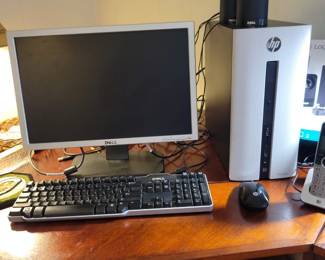 Dell monitor and keyboard, mouse. HP desktop.