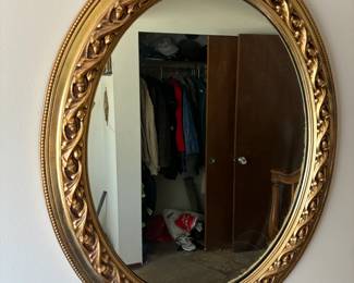 Oval accent mirror