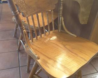 4 matching Oak swivel bar stools, all in excellent condition!