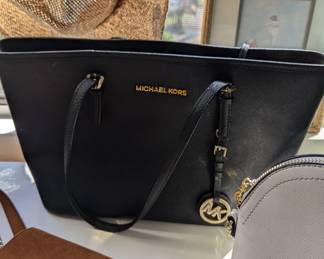 Michael Kors ! I'll take this if no one does 