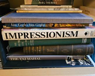 Several art books and other coffee table books.