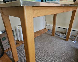 Another bar height table, this one with a metal top.