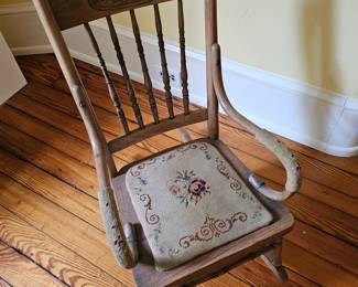 Childs antique rocker with needle point.