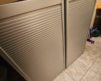 From ikea... roll down door fronts for storage.