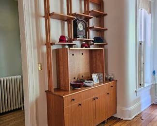 A custom built in cabinet wall unit.