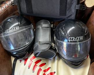 Baseball chair, helmets, and saddle bag