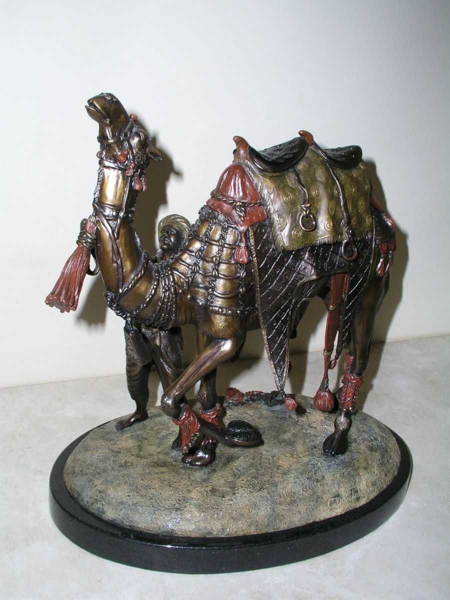 Bronze Camel "Parade Day" by Carole A. Danyluk, #12/33, Signed. 15"x15"x9". Excellent condition. Asking $895.
