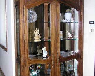 Gorgeous large curio china cabinet. Lighted. Asking $595.