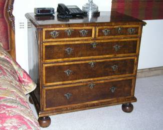 Wm. and Mary Style Oyster-wood Chest of Drawers. Veneer circular inlay on top, cut-brass pulls and bun feet. Late 17th Century. Some damage to top, as expected because of its age. Asking $495.