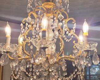 Ornate crystal chandelier, approx 16" wide and 22" tall. Purchased in early 1980's