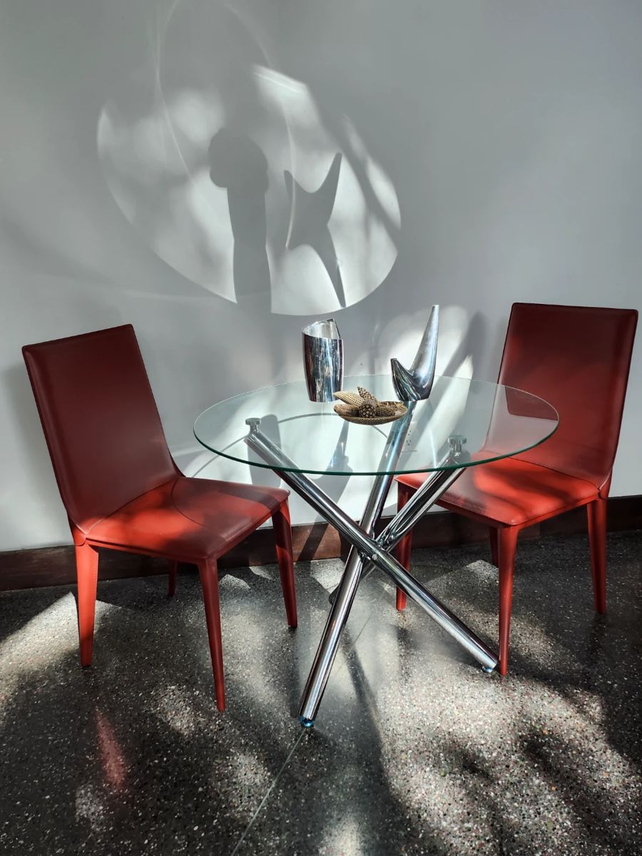 Frag handmade leather chairs from Italy. There are 6 of them.