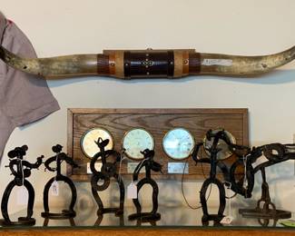 steer horns and iron hand made figures