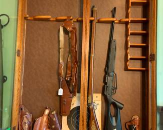 wall mounted gun rack, air rifles, hoslters