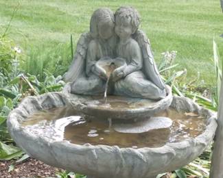 Elegant concrete Angel Fountain.   3 pieces consisting of base, level 1 and top statue with 2 angels.  In perfect working condition.  Includes existing pump.