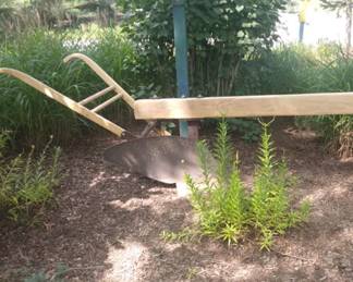 Rebuilt antique plow.