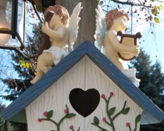 Cherub birdhouse.