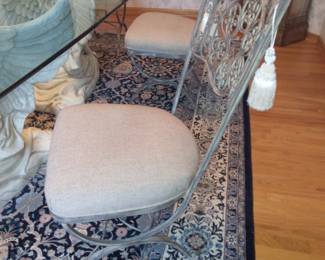 Included with Angel Dining Room Table. 12 wrought iron dining room chairs finished in a light bronze and cream colored cloth seats.  Beautiful scrolls and details on chair back.