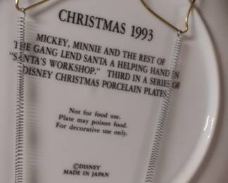 Back side Disney Collector plate.