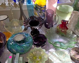 Colored art glass vases, bowls and pitchers