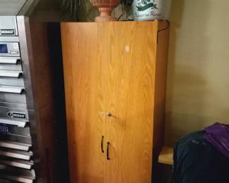 Storage cabinet with key.