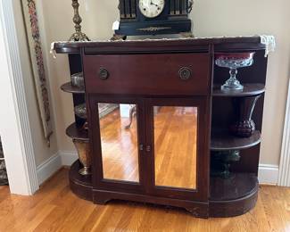 A23 - $75. Cabinet with secretary drawer. Measures 48" wide x 15" deep x 36" tall. Needs minor repairs - really neat entry/display piece. 