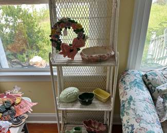 A121 - $65. Small White Wicker Shelving Unit. I believe it folds flat to transport. 