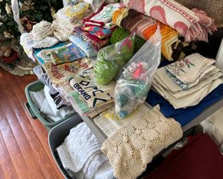 A117 - Lots of individually priced linens. 