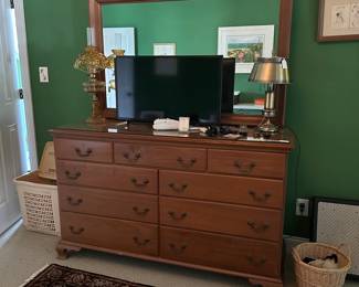 A77 - $150 Dresser with mirror - measures 60" wide, 21" deep, 36.5" tall, 72" tall (with mirror). Has glass top on dresser - it looks like water got under one spot and discolored the top a bit. Does not effect function. 
