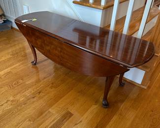 A28 - $45 Solid Wood Coffee Table. Measures 48" wide x 16" deep x 18" tall. 
