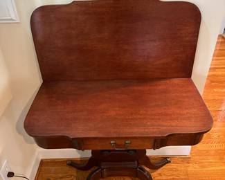 A12 - $145. Lyre Pedestal Base Game Table. Measures 32" wide x 16" deep (folded 1/2) x 29.5" tall. 