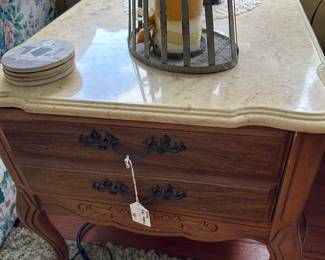 A124 - $40 PAIR of marble top side tables with drawers. Measures 22" x 28" x 21" tall. 