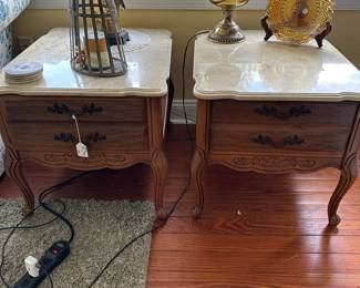 A124 - $50 PAIR of marble top side tables with drawers. 