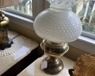 A125 - $15 brass lamp with milk glass shade. 