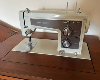 A62 - $50 sewing machine - measures 25" wide, 18" deep, 31" tall