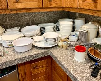 Dishes and cast iron skillet, breadstick. Other pots and pans