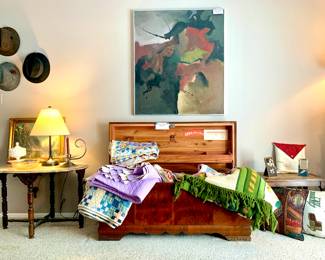 Lane cedar chest, quilts, oil painting