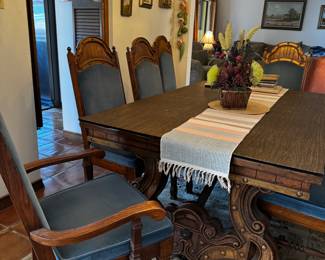 Statement piece dining table with 7 chairs