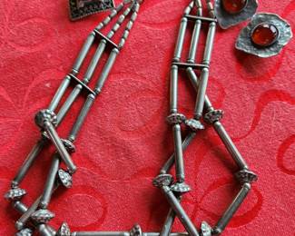 Designer Silver Earrings on the left  and Silver Beaded Necklace. Silver Earrings on Right. 