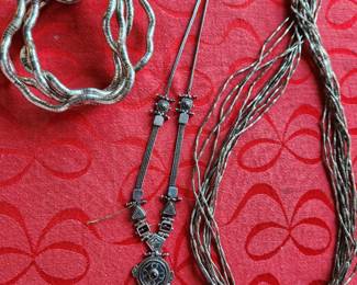 Liquid Silver Necklace on the right. 