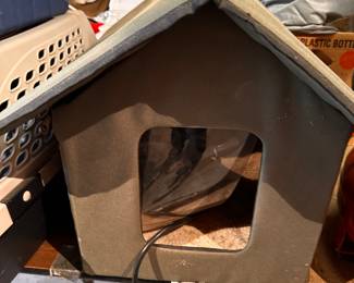 This is a heated outdoor cat house! 