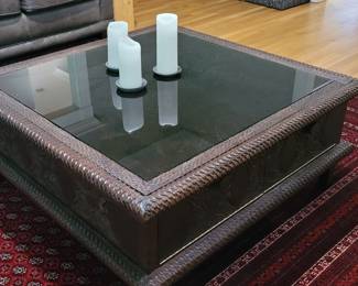 Coffee table from Ethiopia.  Hand carved with traditional tribal designs.  Side doors open to display items under glass top.