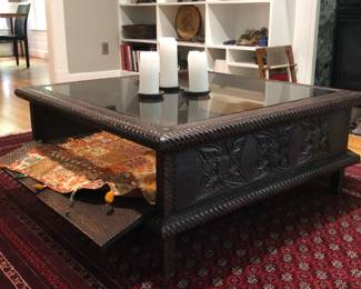 Table opens on the sides for storage and display