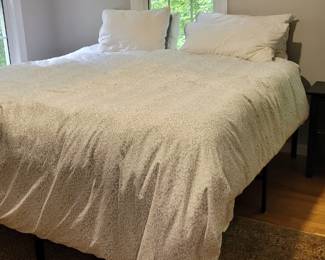 Beautyrest Black Hybrid Plus King mattress on steel Crate & Barrel bedframe, duvet and bedding sold separately