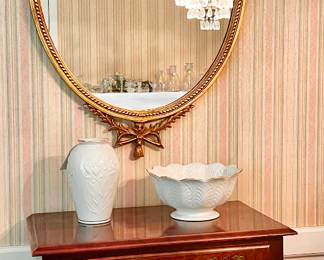 Baroque mirror atop silverware standing chest with Lenox