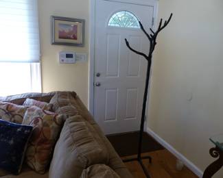 Tree branch coat rack