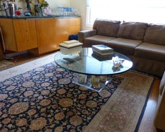 Vintage glass top coffee table with animal horns & lucite base