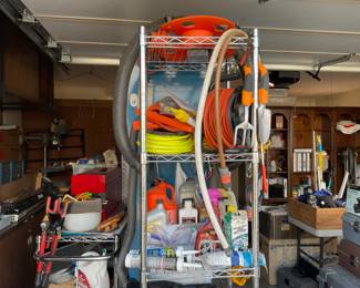 Cords, caulk, household items, the silver rack 